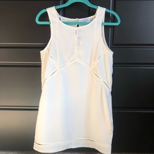 Cute White Dress with Pockets and Fun Cutouts!